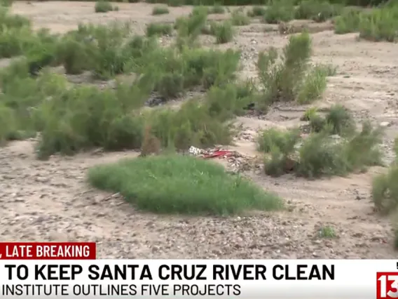 Image of Santa Cruz River from bank with chyron Grant to Keep Santa Cruz River Clean