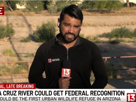 Video still of John Macaluso reporting at the Santa Cruz River