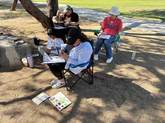 Teachers working on field journaling