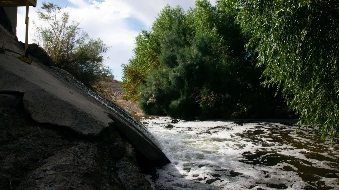 Effluent gushes out of the outfall into the Santa Cruz River. 