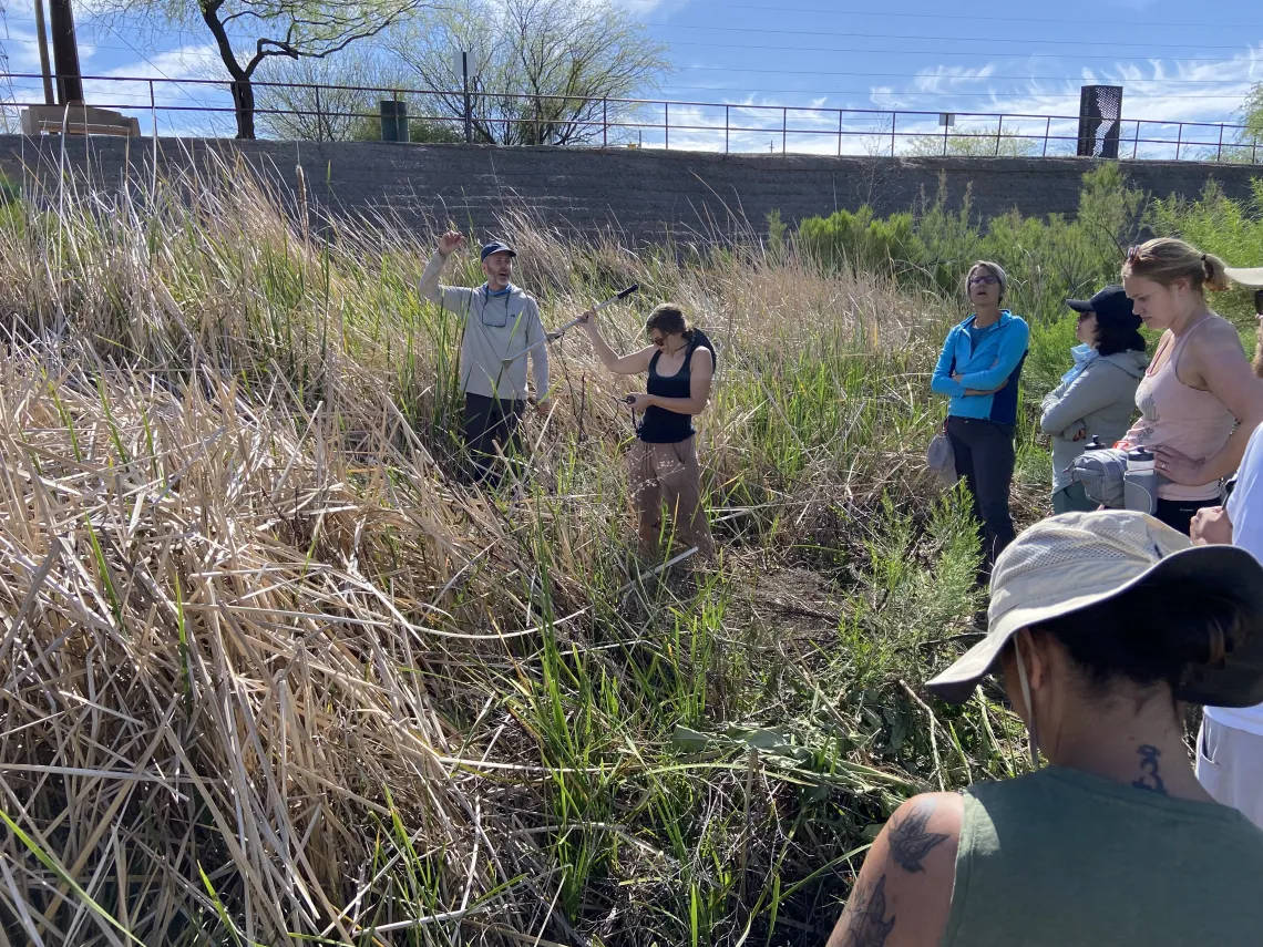 Teachers listening to instructions on Santa Cruz River