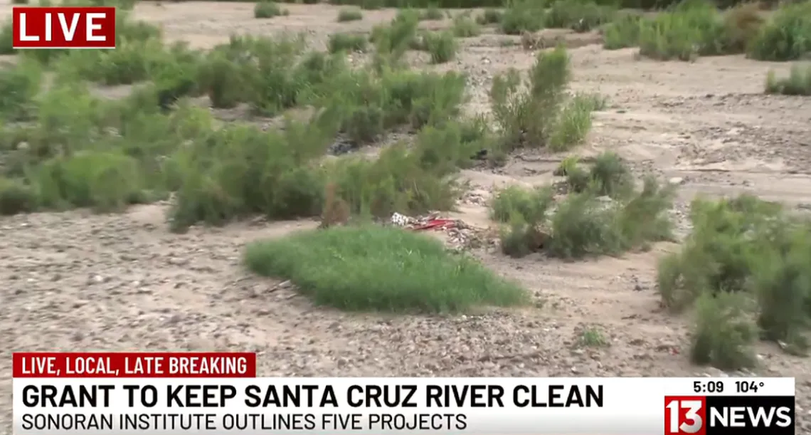 Image of Santa Cruz River from bank with chyron Grant to Keep Santa Cruz River Clean