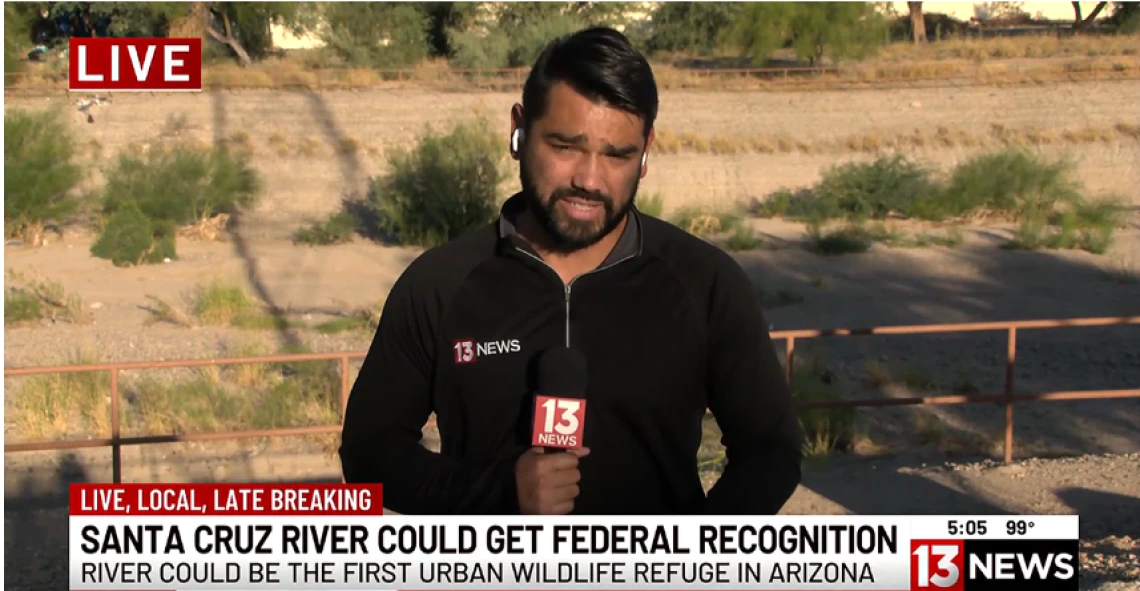 Video still of John Macaluso reporting at the Santa Cruz River