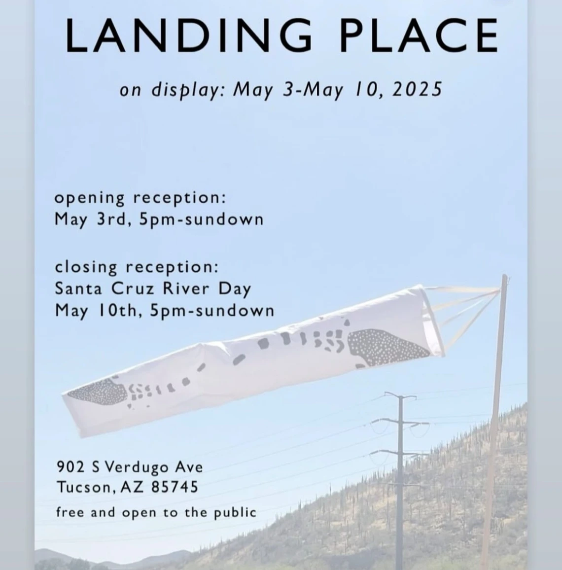 Picture of wind sock with hill behind it. Details of Landing Place opening reception