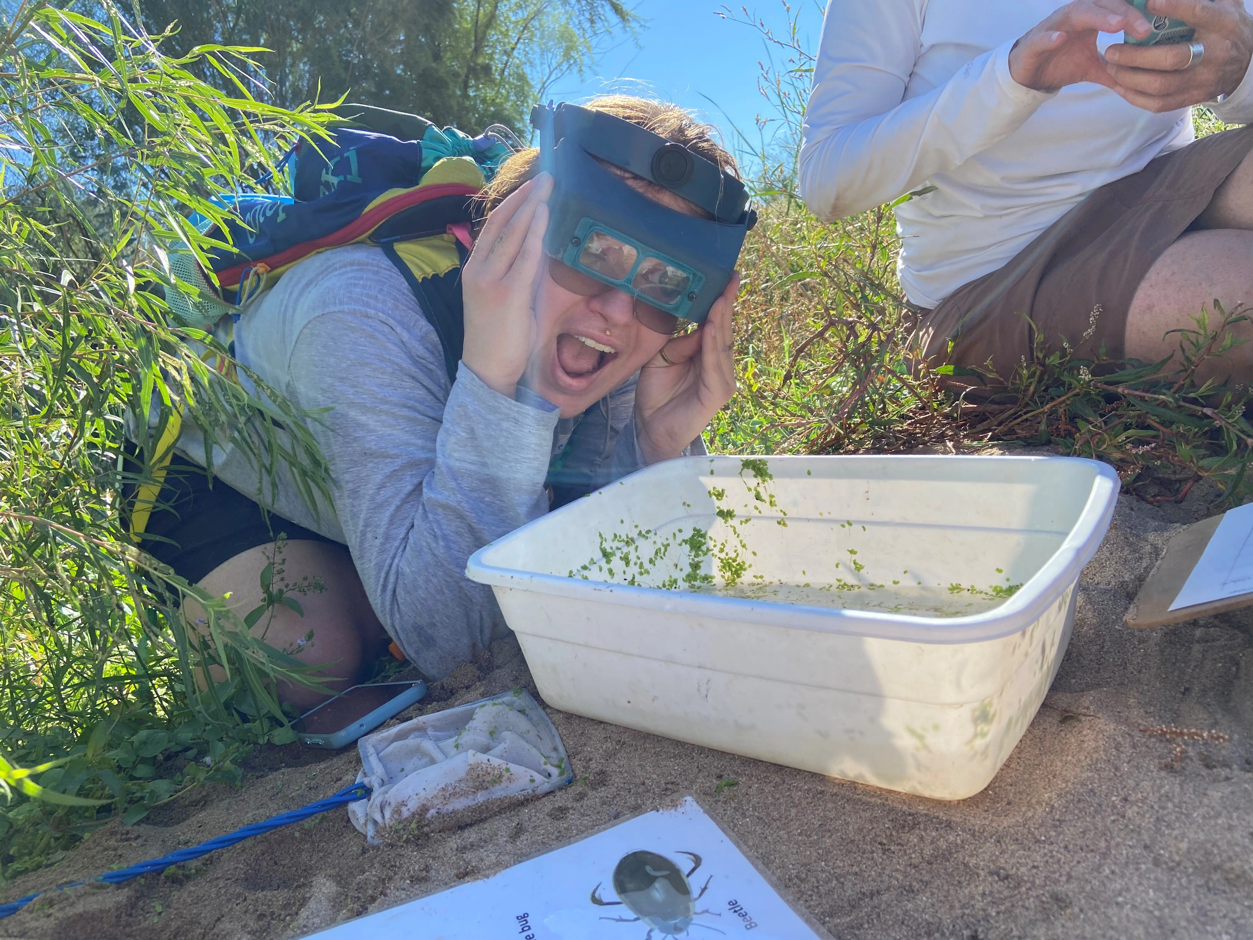 Teacher wearing visor looking surprised