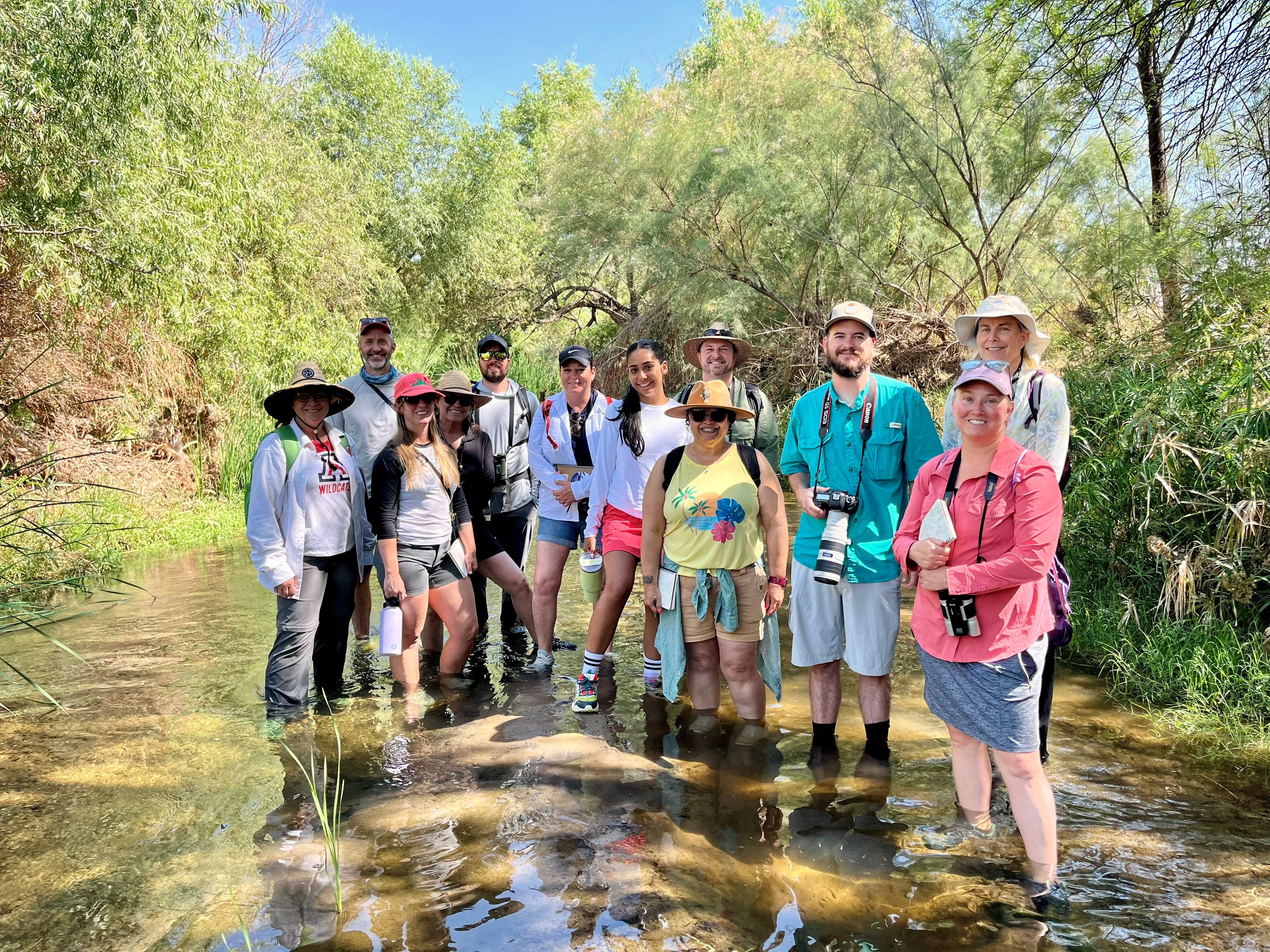 Group of BIORETS teachers standing in the Santa Cruz River