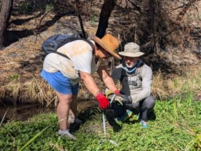 Michael Bogan showing teachers how to measure invasive turtles in the Santa Cruz River